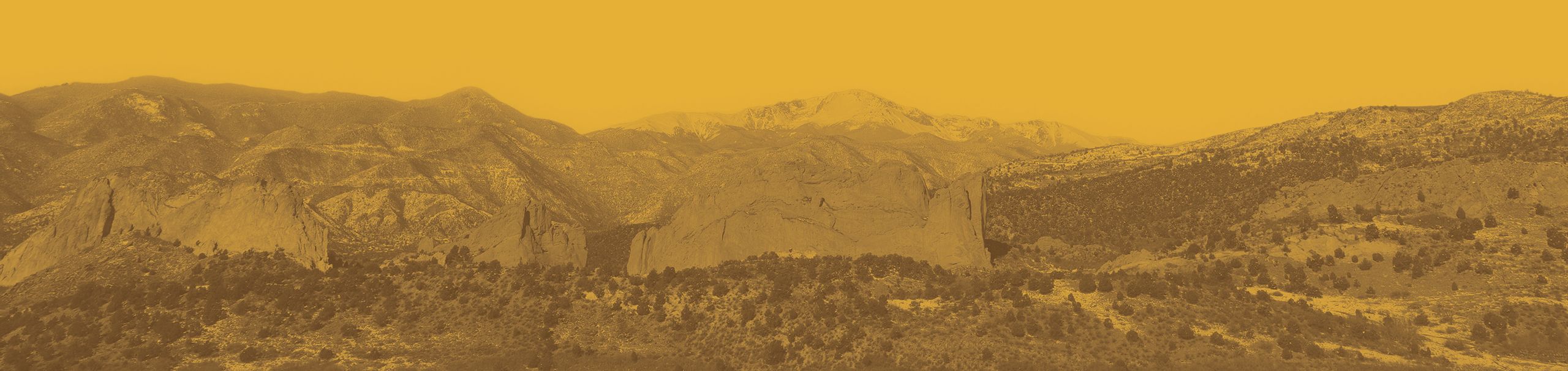 Garden of the Gods with Pikes Peak in the background.
