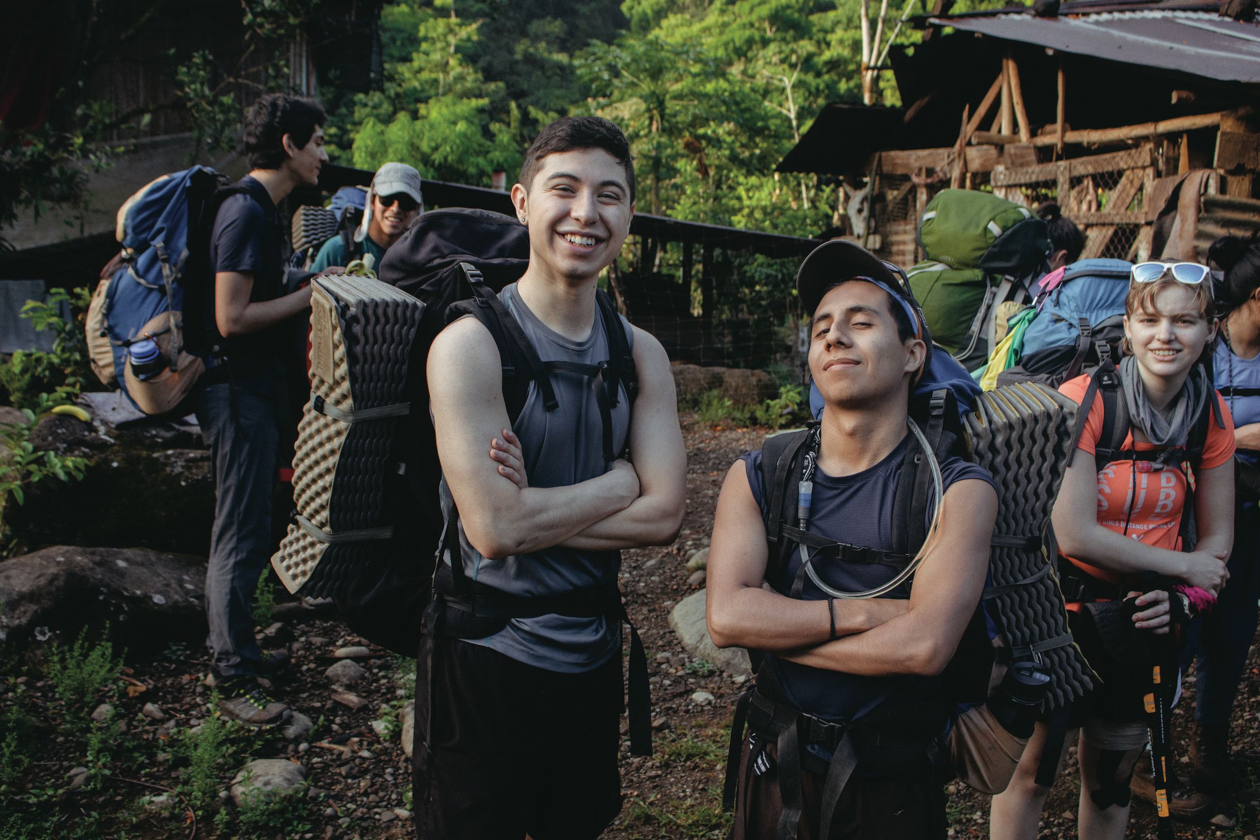 Students with backpacking gear getting ready to go hike in the Costa Rican rainforest.