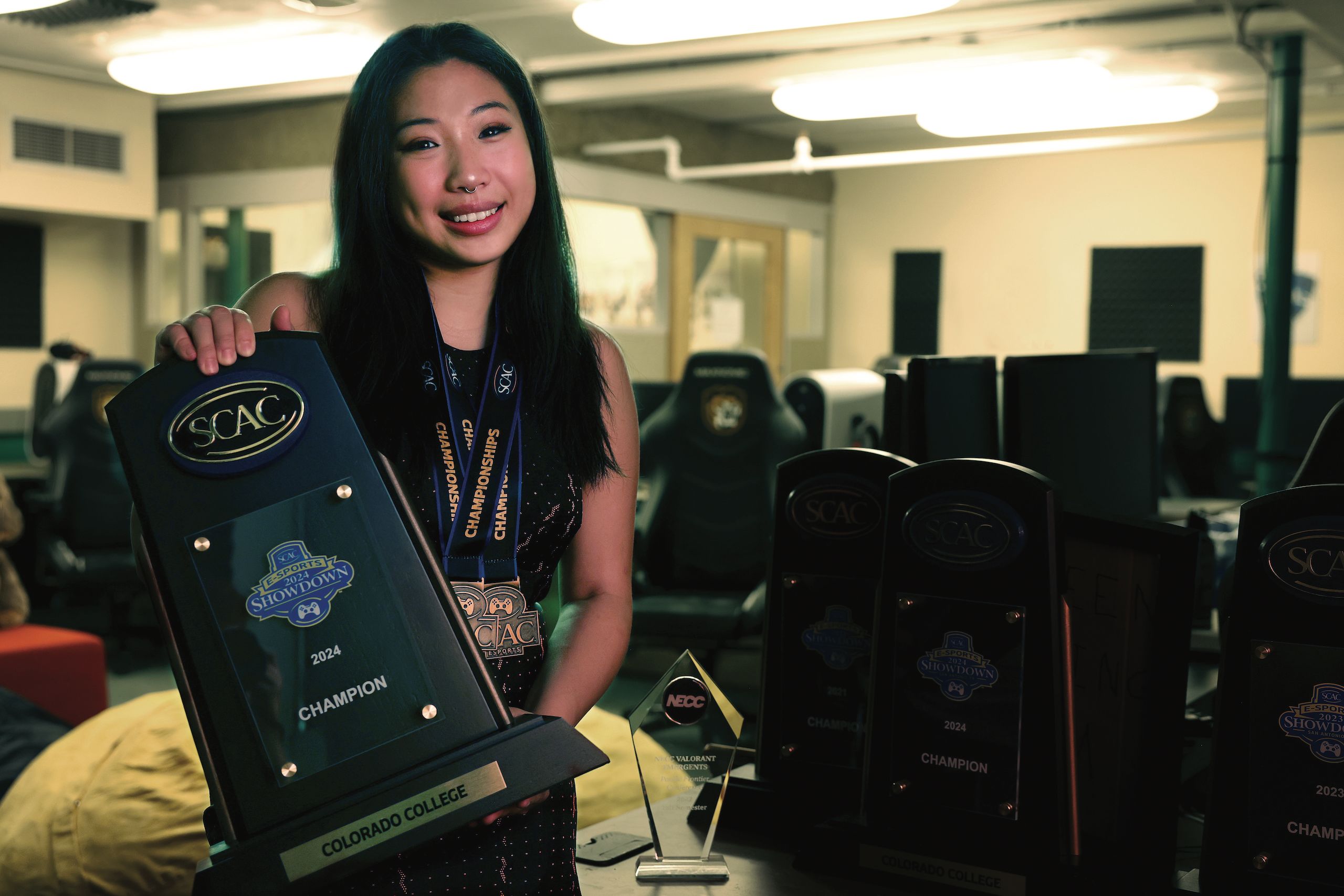Primera Hour '25 with her first place award from the Harvard Hackathon competition.